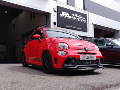 Red 2021 Abarth Outside Next To JFA Sign